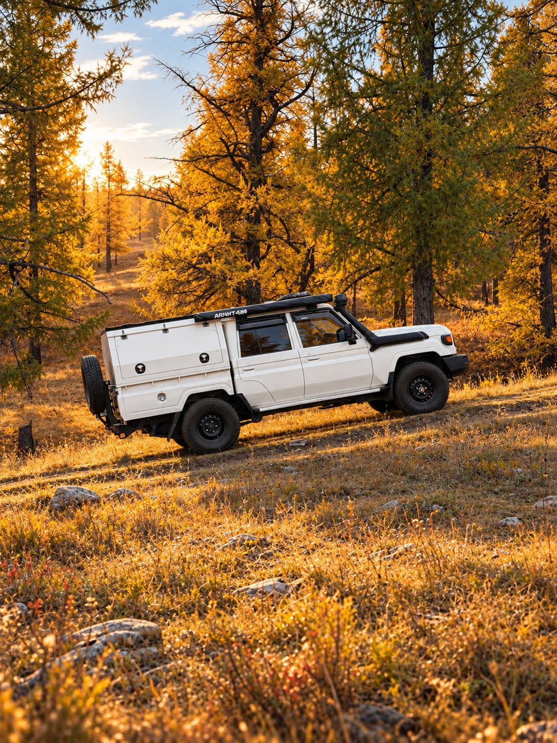 Land Cruiser 79 parked among golden autumn trees