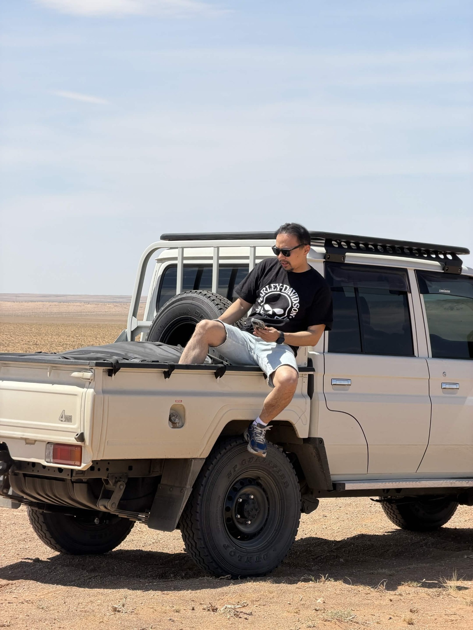 Traveller beside the Land Cruiser in Mongolia